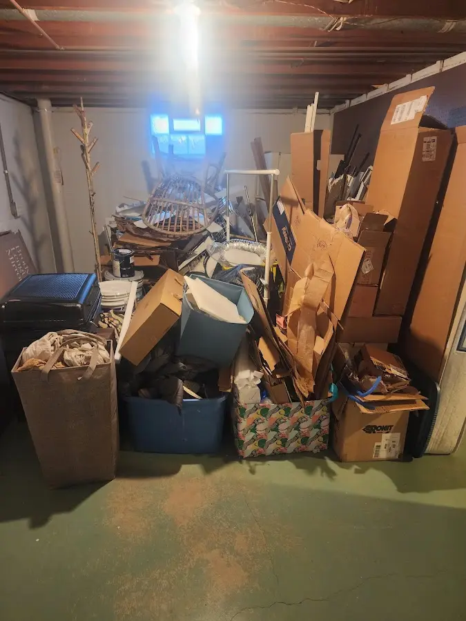 Roll-off dumpster container at job site for 8 Yard Dumpster Rental in Plymouth